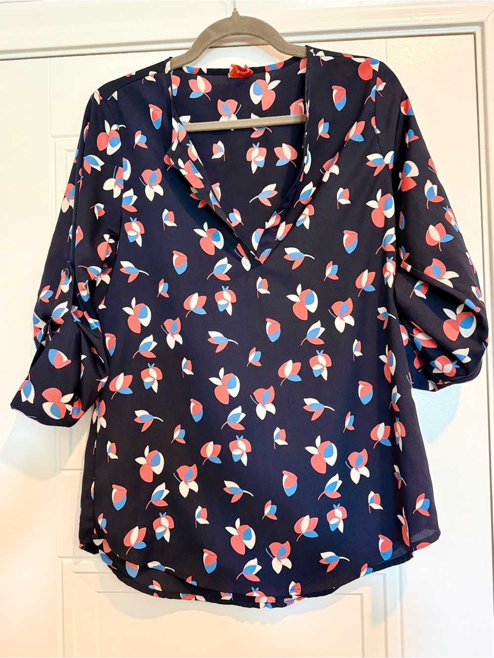 Pixley Navy Floral-Pattern V-Neck Blouse with Coral and Light Blue Accents